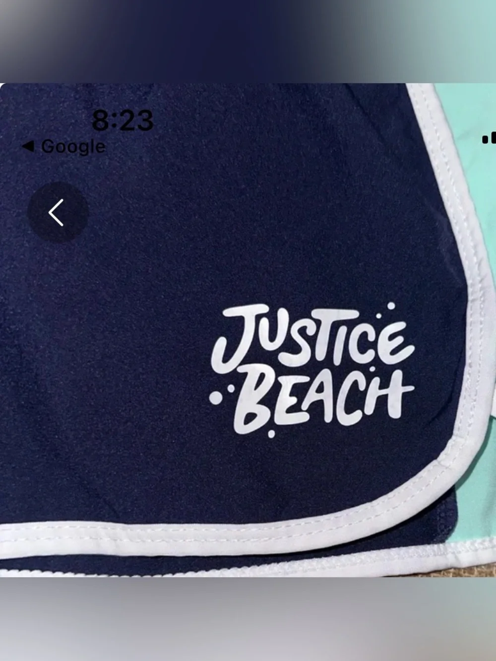 Justice Girls Lilac Butterfly Tank Top and a Pair of Justice Beach Board Shorts